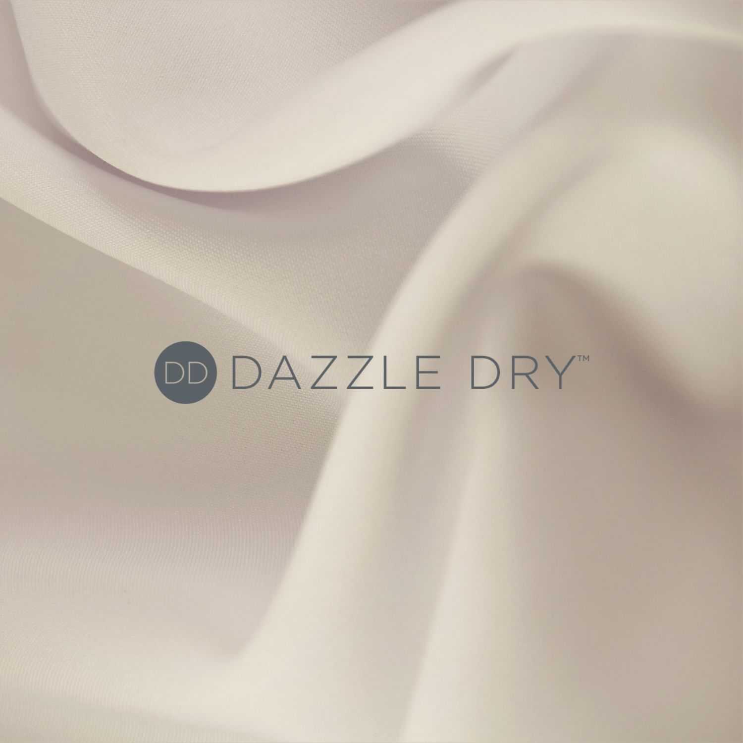 Soft, flowing beige fabric with "DAZZLE DRY" logo centered.