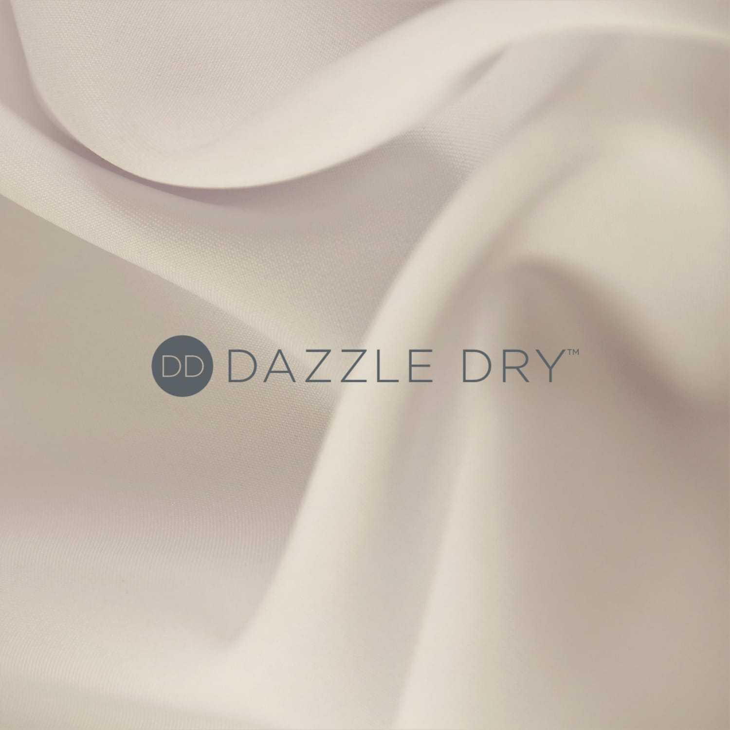 Soft, flowing beige fabric with "DAZZLE DRY" logo centered.